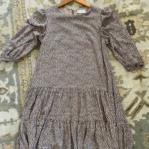 Cheetah mini dress Three quarter bishop sleeves Keyhole and button back closure